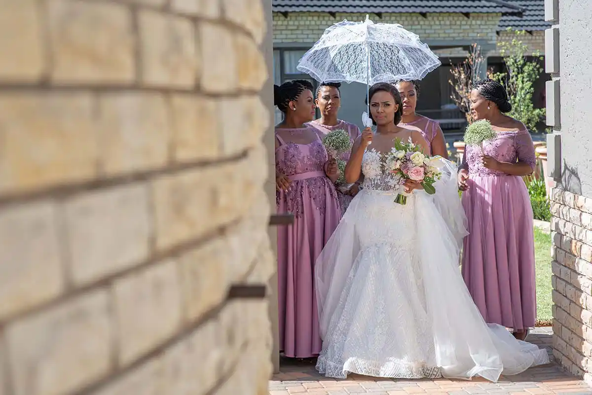 bride waiting to walk to wedding pink bridemaids dresses bloemfontein photographer