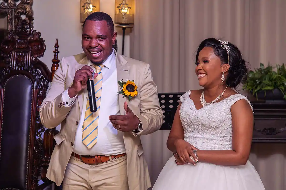 Happy Wedding couple at wedding in Bloemfontein Tuscan Rose by Mudboots Photography